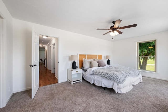 2746 Kinneys Rd, Cedar Hill, TN 37032 - carpeted bedroom featuring baseboards and a ceiling fan