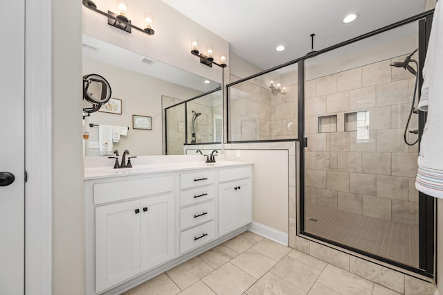 319 Edna May Dr, Murfreesboro, TN 37128 - bathroom with a stall shower, double vanity, tile patterned floors, and recessed lighting