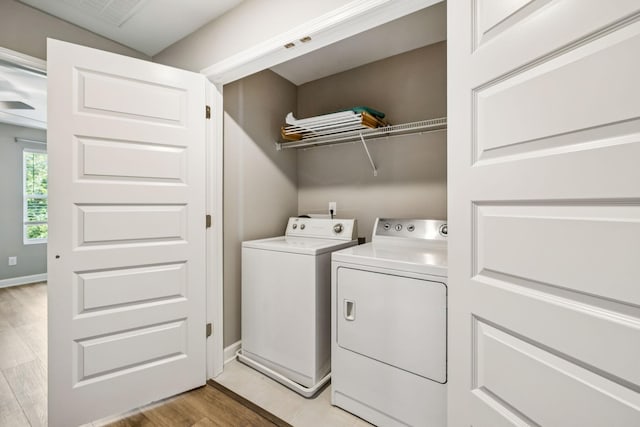 2557 Napa Valley Way, Columbia, TN 38401 - washroom with washer and clothes dryer and light wood-style floors