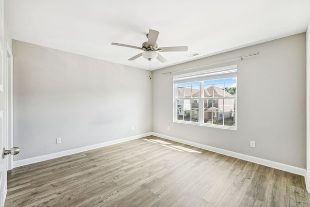 2557 Napa Valley Way, Columbia, TN 38401 - spare room with wood finished floors and ceiling fan