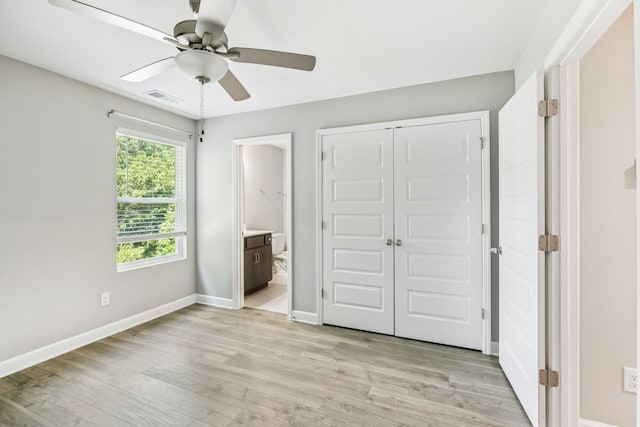 2557 Napa Valley Way, Columbia, TN 38401 - unfurnished bedroom with light wood finished floors, a closet, ensuite bathroom, and ceiling fan