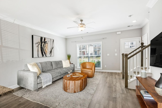 2557 Napa Valley Way, Columbia, TN 38401 - living area with ornamental molding, stairs, a ceiling fan, and wood finished floors