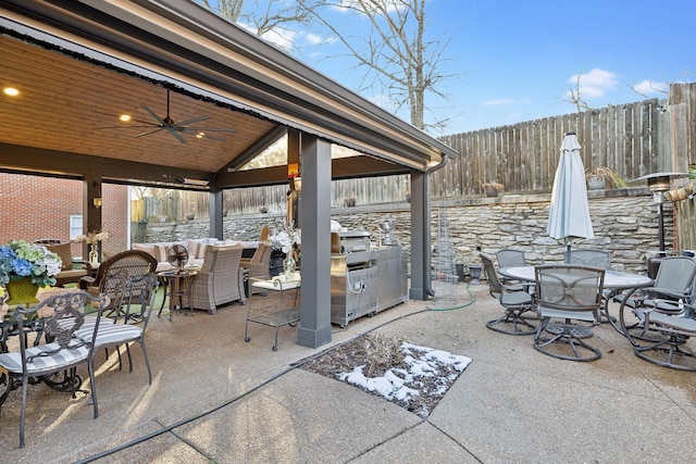 314 W 6th St, Columbia, TN 38401 - fenced backyard with outdoor dining area, a gazebo, ceiling fan, a patio area, and an outdoor hangout area