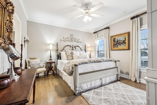 314 W 6th St, Columbia, TN 38401 - bedroom with wood finished floors, crown molding, and a ceiling fan