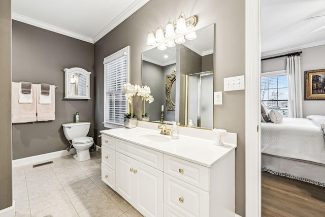 314 W 6th St, Columbia, TN 38401 - full bathroom featuring ornamental molding, vanity, connected bathroom, a stall shower, and tile patterned floors