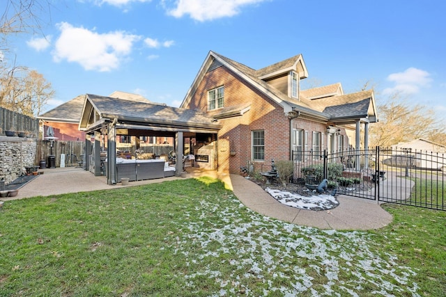 314 W 6th St, Columbia, TN 38401 - back of property featuring an outdoor hangout area, a fenced backyard, brick siding, a patio, and a gate