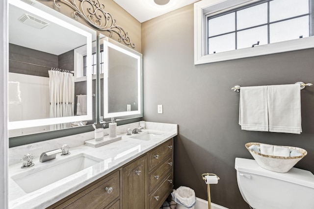 314 W 6th St, Columbia, TN 38401 - full bathroom with double vanity and a shower with shower curtain
