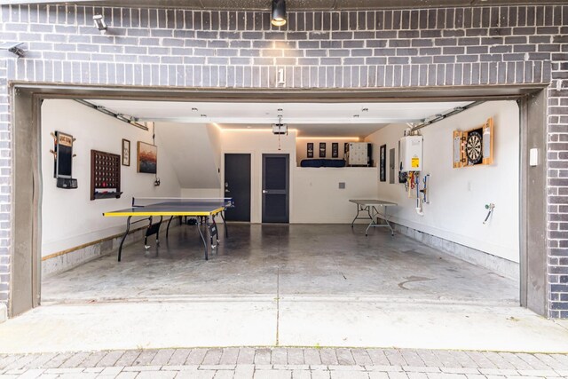 2910 Felicia St Unit 1, Nashville, TN 37209 - garage featuring tankless water heater and a garage door opener