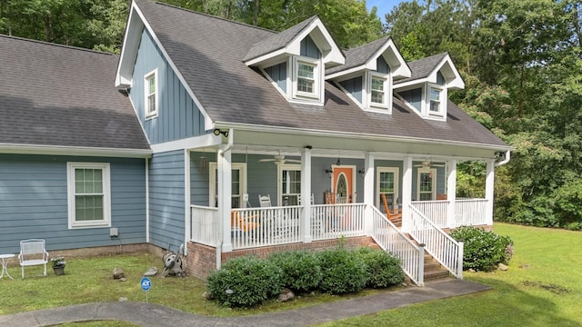 4200 Happy Valley Rd, Flintstone, GA 30725 - new england style home featuring a porch, ceiling fan, a front lawn, and stairway