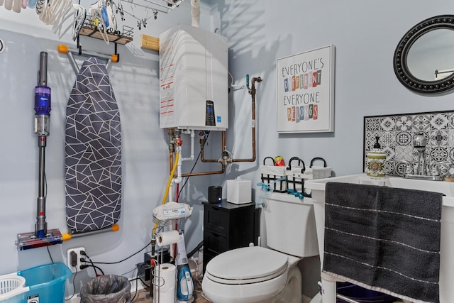 4200 Happy Valley Rd, Flintstone, GA 30725 - bathroom featuring tankless water heater and toilet