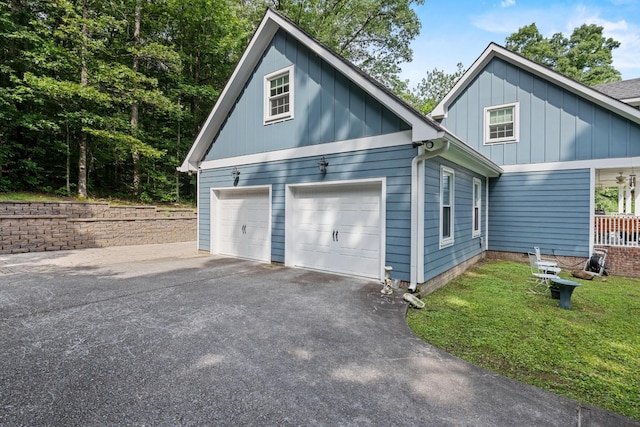 4200 Happy Valley Rd, Flintstone, GA 30725 - view of property exterior with board and batten siding and asphalt driveway
