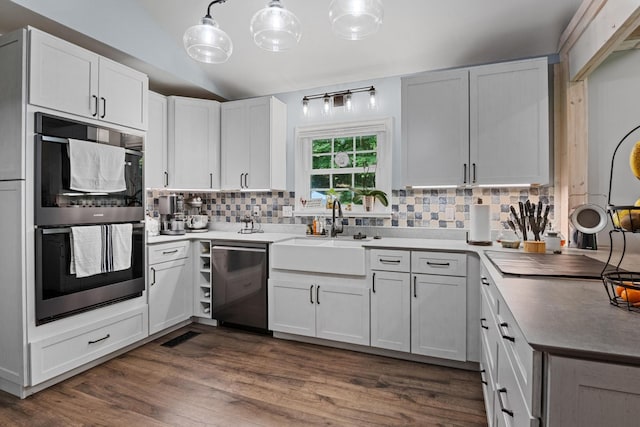 4200 Happy Valley Rd, Flintstone, GA 30725 - kitchen with stainless steel appliances, lofted ceiling, backsplash, dark wood-style flooring, and light countertops
