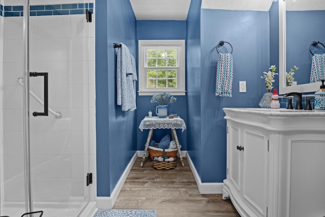 4200 Happy Valley Rd, Flintstone, GA 30725 - bathroom with wood finished floors, a stall shower, and vanity