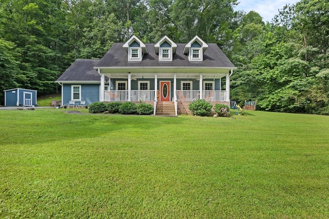 4200 Happy Valley Rd, Flintstone, GA 30725 - cape cod-style house with a porch, a front lawn, and a storage unit