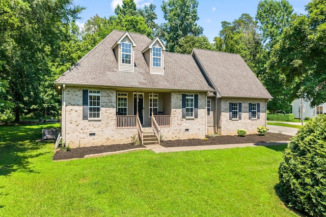 516 Delacy Dr, Fairview, TN 37062 - cape cod-style house with crawl space, a porch, a front yard, and brick siding