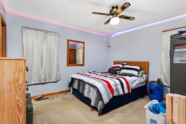 313 S Old Military Rd, Saint Joseph, TN 38481 - carpeted bedroom featuring baseboards and a ceiling fan