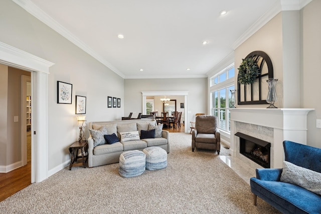 1731 Hudson Rd, Madison, TN 37115 - living room with recessed lighting, ornamental molding, a premium fireplace, and a chandelier