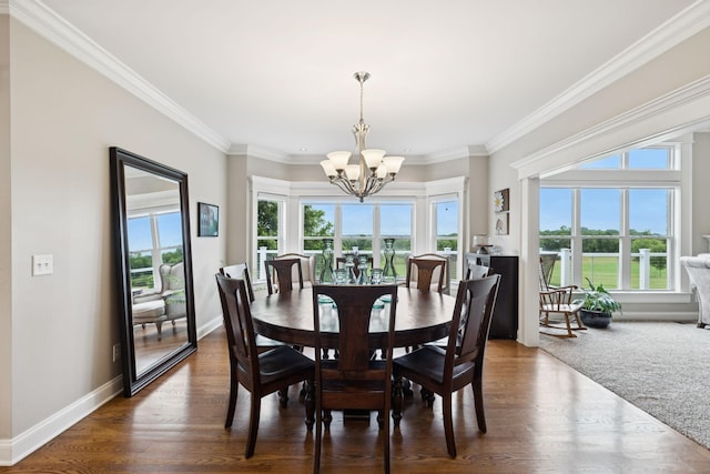 1731 Hudson Rd, Madison, TN 37115 - dining room with a chandelier, healthy amount of natural light, crown molding, and dark wood-type flooring