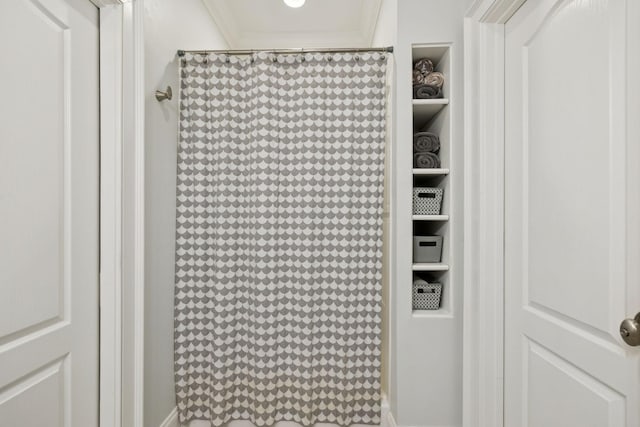 1731 Hudson Rd, Madison, TN 37115 - bathroom view of a shower with curtain and crown molding