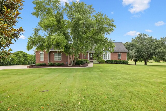 1731 Hudson Rd, Madison, TN 37115 - view of front of home with a front lawn and brick siding