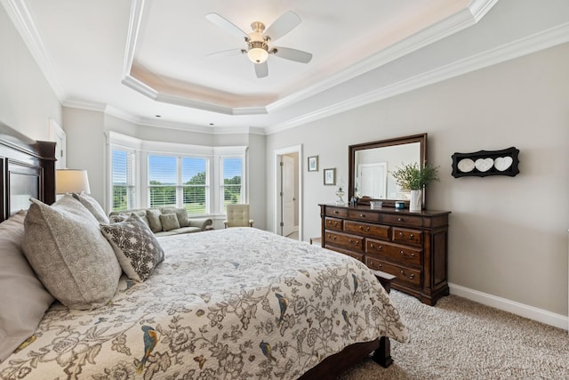 1731 Hudson Rd, Madison, TN 37115 - bedroom featuring crown molding, a tray ceiling, carpet floors, and a ceiling fan