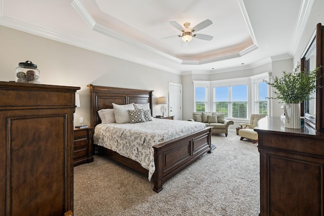 1731 Hudson Rd, Madison, TN 37115 - bedroom featuring light colored carpet, a raised ceiling, multiple windows, ornamental molding, and ceiling fan