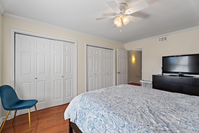 2116 Hobbs Rd Unit K2, Nashville, TN 37215 - bedroom with ornamental molding, wood finished floors, two closets, and a ceiling fan