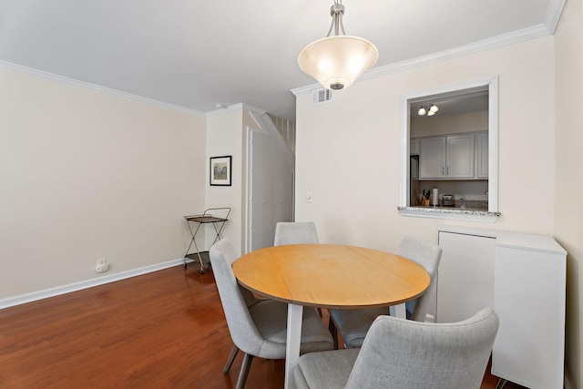 2116 Hobbs Rd Unit K2, Nashville, TN 37215 - dining space featuring dark wood-style floors and crown molding