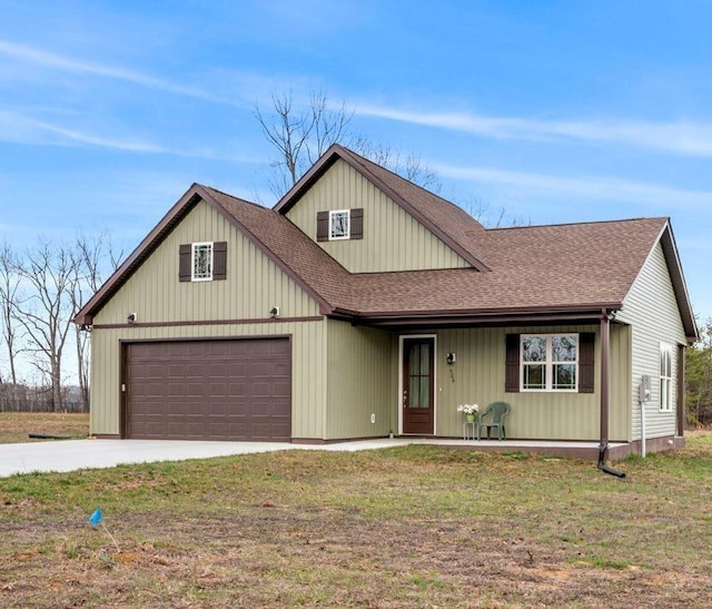 506 Bill Fuson Rd, Mcminnville, TN 37110 - view of front facade with a shingled roof, concrete driveway, a porch, and a front lawn