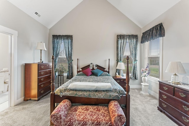 506 Bill Fuson Rd, Mcminnville, TN 37110 - bedroom featuring vaulted ceiling, light carpet, and connected bathroom