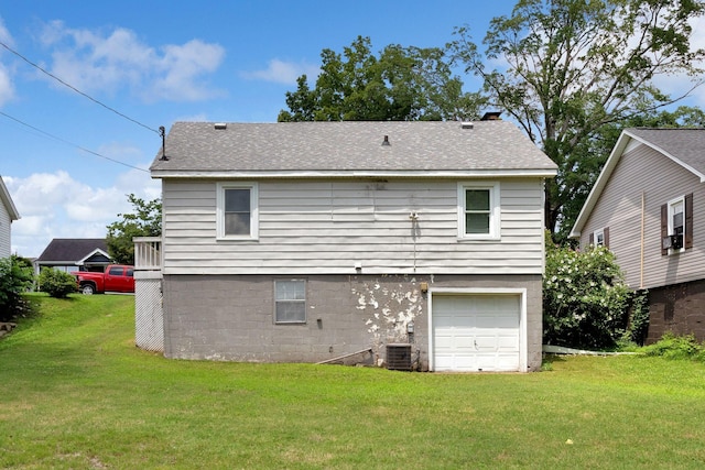 1803 Dimple Ct, Columbia, TN 38401 - back of property with an attached garage, a yard, and roof with shingles