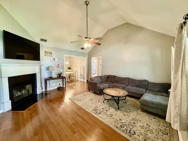 1252 Azure Way, Murfreesboro, TN 37128 - living area with vaulted ceiling, wood finished floors, a ceiling fan, and a fireplace