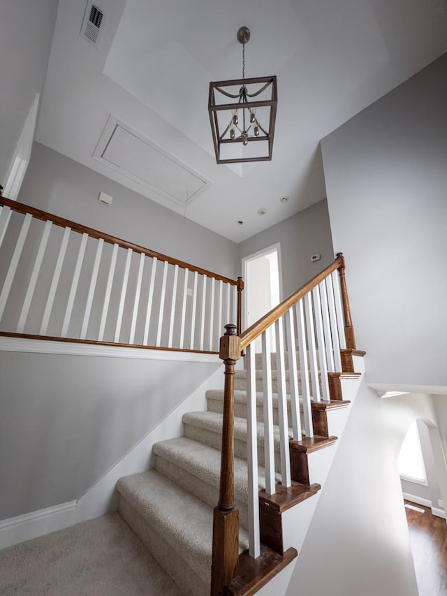 527 32nd Ave S, Nashville, TN 37212 - stairs with attic access and baseboards