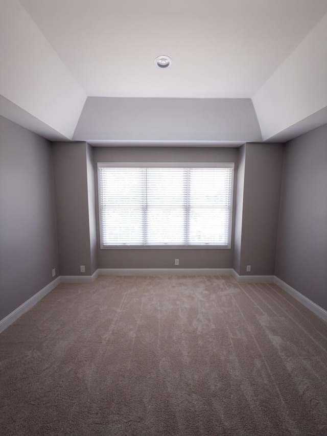 527 32nd Ave S, Nashville, TN 37212 - carpeted spare room featuring a tray ceiling and lofted ceiling