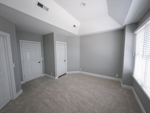 527 32nd Ave S, Nashville, TN 37212 - unfurnished bedroom with light colored carpet and a raised ceiling