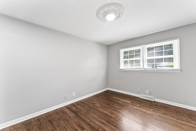 1006 Houston Dr, Murfreesboro, TN 37130 - empty room featuring baseboards and dark wood-style flooring