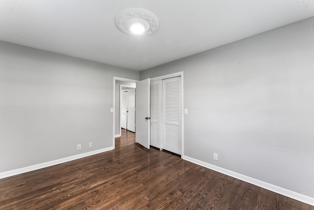 1006 Houston Dr, Murfreesboro, TN 37130 - unfurnished bedroom featuring dark wood-style flooring and a closet
