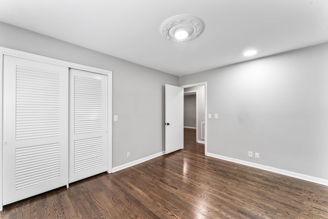 1006 Houston Dr, Murfreesboro, TN 37130 - unfurnished bedroom with dark wood-style floors, a closet, and recessed lighting