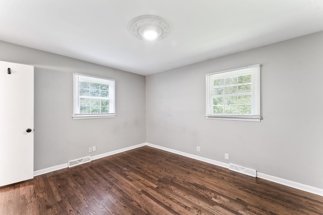 1006 Houston Dr, Murfreesboro, TN 37130 - unfurnished room with dark wood-type flooring and baseboards