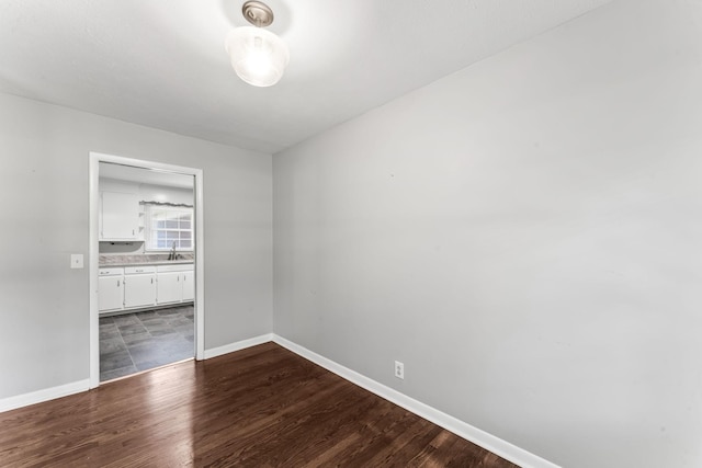 1006 Houston Dr, Murfreesboro, TN 37130 - unfurnished bedroom featuring dark wood-type flooring and ensuite bathroom