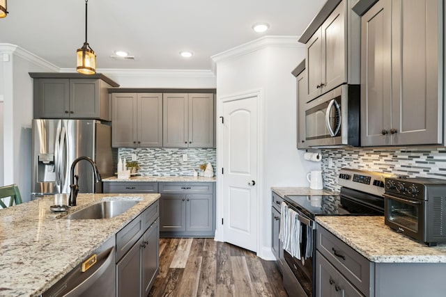 5123 Vinnie Dell Dr, Chapel Hill, TN 37034 - kitchen featuring stainless steel appliances, crown molding, dark wood-style floors, decorative backsplash, and light stone counters