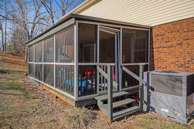 783 W Main St, Mcminnville, TN 37110 - view of side of home with brick siding and a sunroom