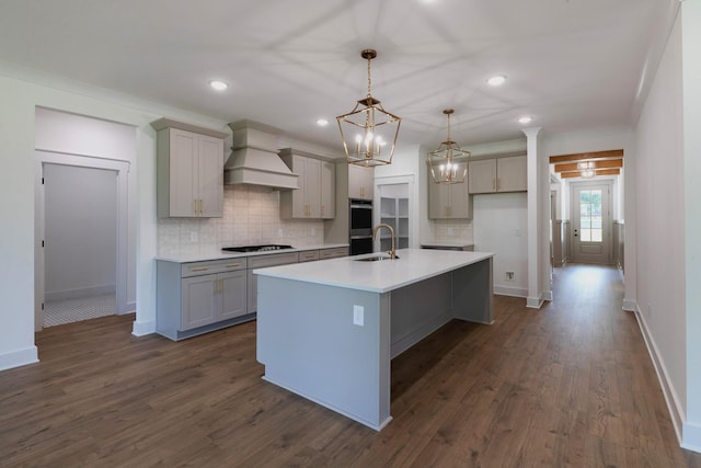 19 Peyton Pl, Columbia, TN 38401 - kitchen with custom range hood, gray cabinets, a chandelier, tasteful backsplash, and recessed lighting