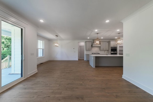 19 Peyton Pl, Columbia, TN 38401 - kitchen featuring a chandelier, light countertops, recessed lighting, backsplash, and dark wood-style flooring