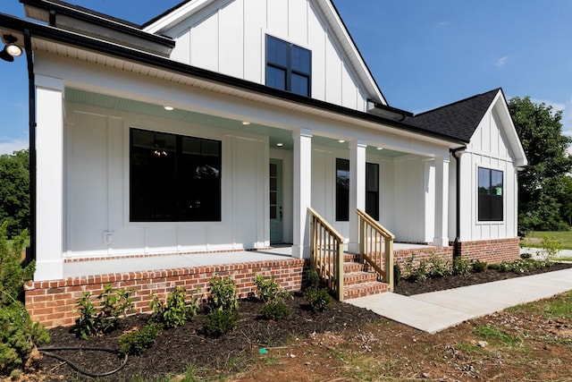 19 Peyton Pl, Columbia, TN 38401 - modern farmhouse with board and batten siding, covered porch, and a shingled roof