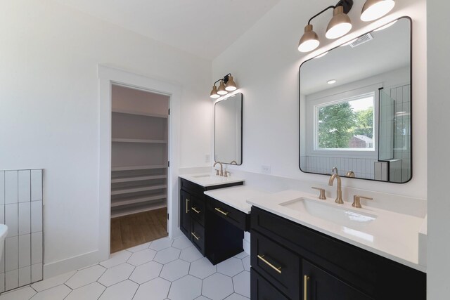 19 Peyton Pl, Columbia, TN 38401 - full bathroom with double vanity, a spacious closet, and tile patterned floors