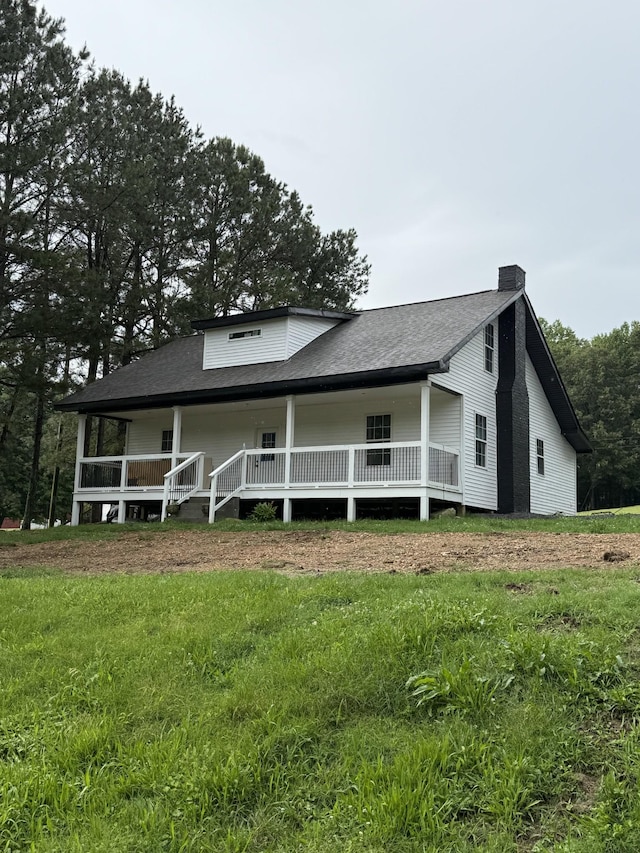 975 Witcher Hollow Rd, Red Boiling Springs, TN 37150 - view of front of home featuring a porch, a chimney, and a shingled roof