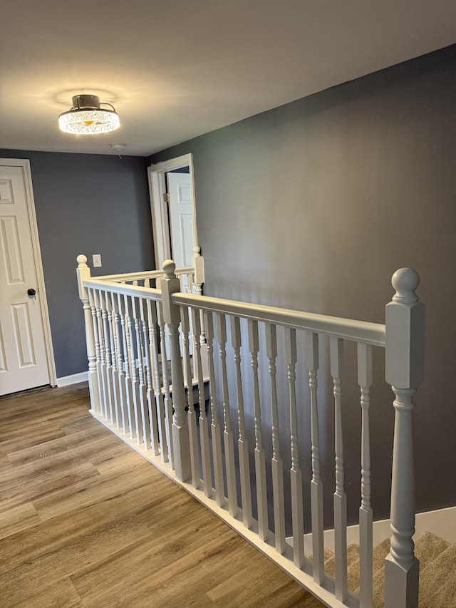 975 Witcher Hollow Rd, Red Boiling Springs, TN 37150 - corridor with an upstairs landing and wood finished floors