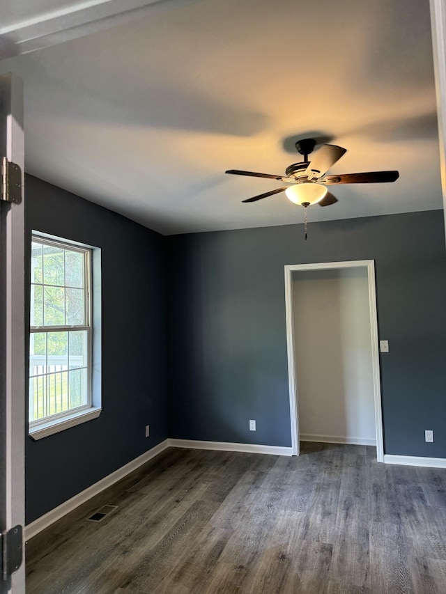975 Witcher Hollow Rd, Red Boiling Springs, TN 37150 - spare room with dark wood-type flooring and ceiling fan