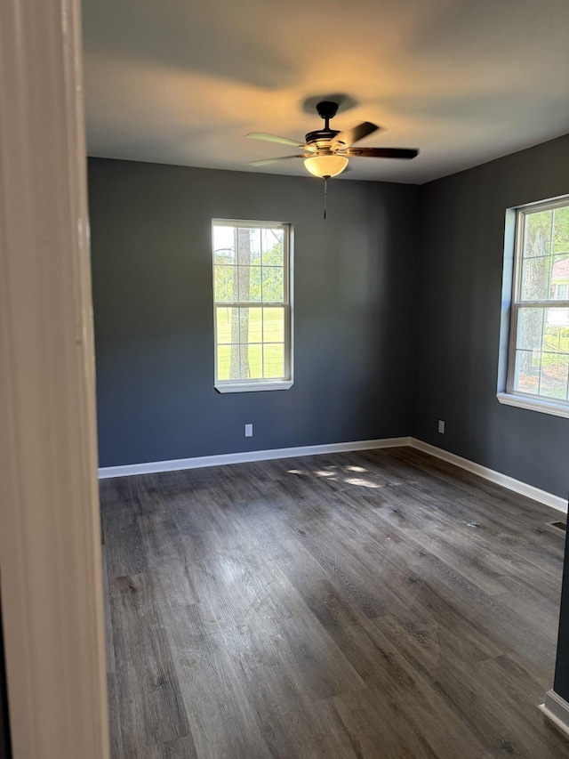 975 Witcher Hollow Rd, Red Boiling Springs, TN 37150 - spare room featuring dark wood-type flooring and ceiling fan